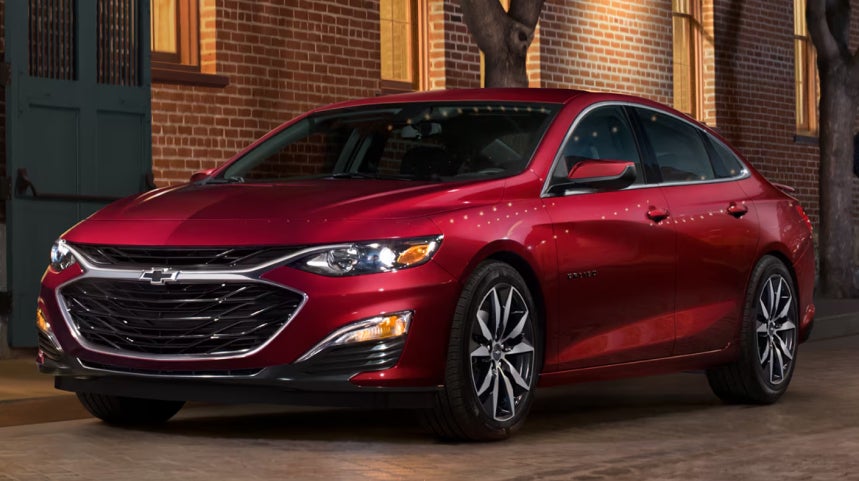 Red Chevrolet Sedan parked